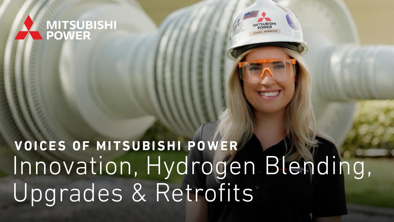Picture of a female Mitsubishi Power employee in hardhat and safety glasses