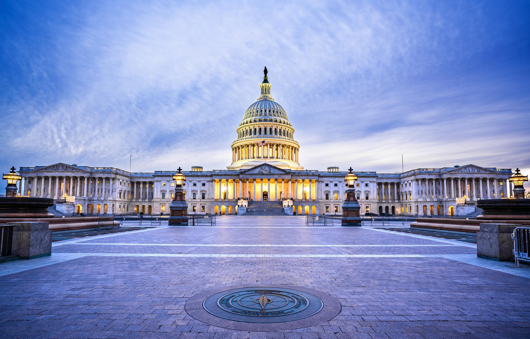 The Capitol Building in Washington, D.C., USA lit up in the early evening.