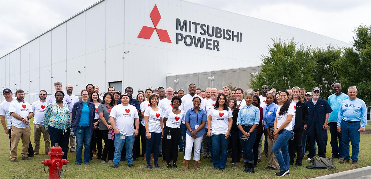 Mitsubishi Power Americas volunteers standing in front of SMW