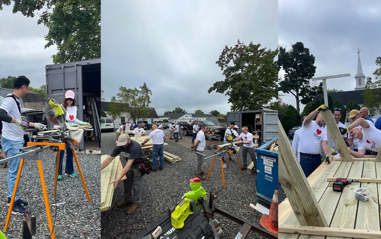 Basking Ridge Impact Day 2024 Mitsubishi Power employees building tables
