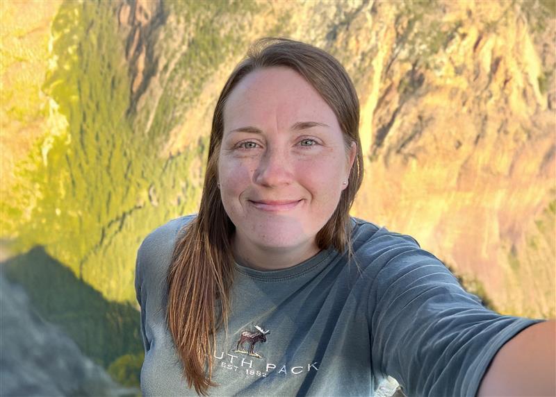 Girl with mountain behind her