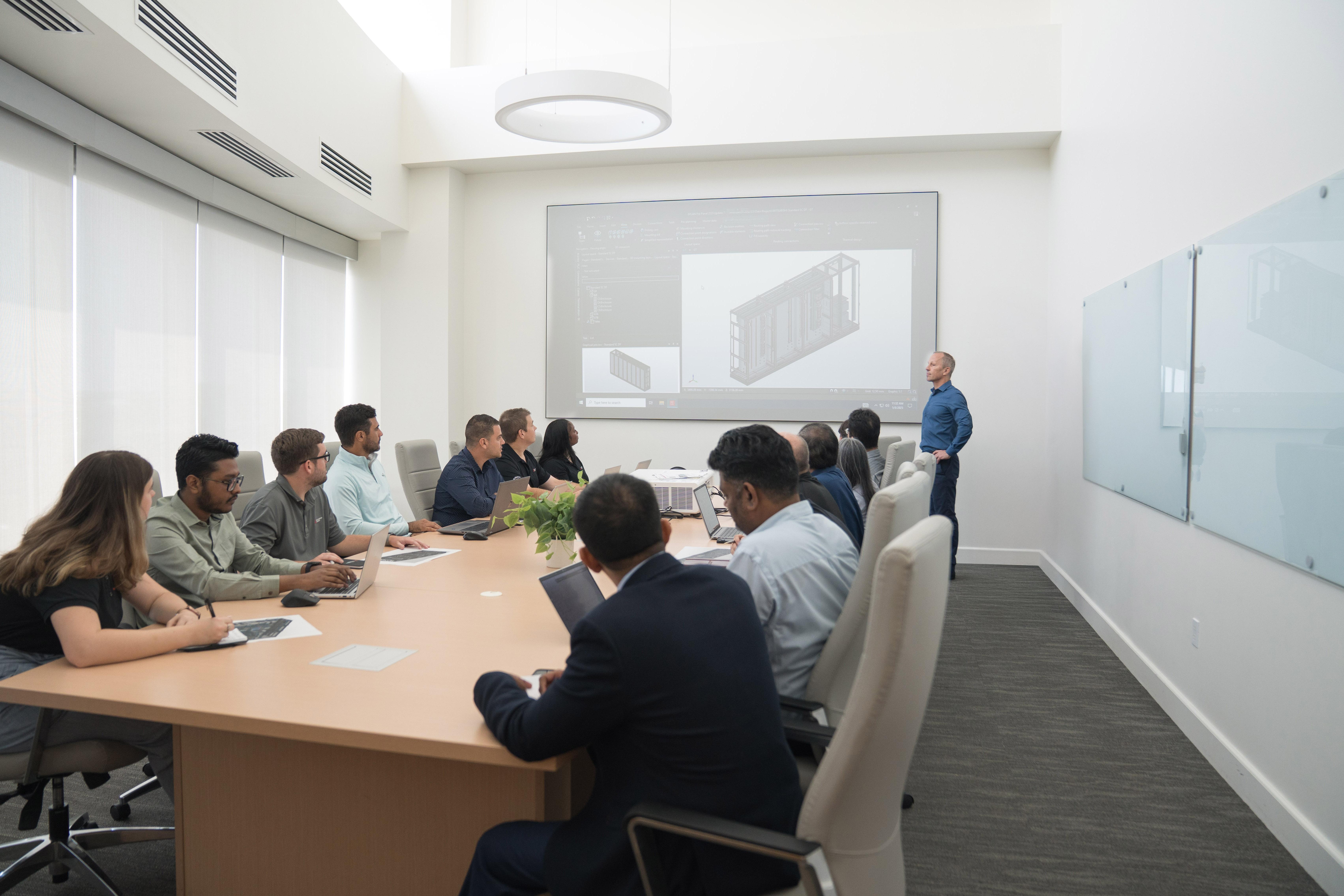 Mitsubishi Power engineers in a boardroom